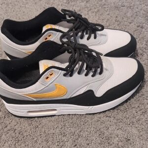 Nike Men's White and Black Sneakers with Yellow Accents